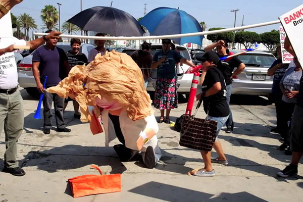 American Apparel staff create piñata of CEO
