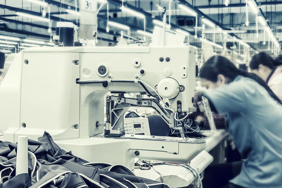 Boohoo warehouse workers disciplined 'for smiling', investigation alleges 