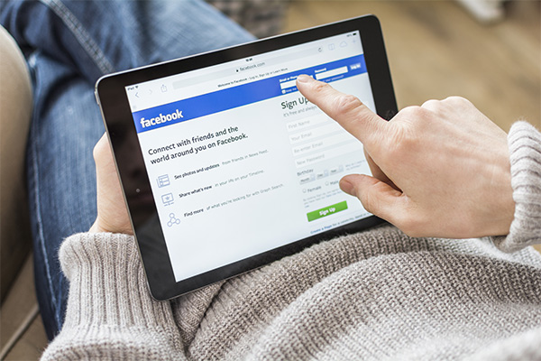 Man sacked by text for 'liking' a photo on Facebook