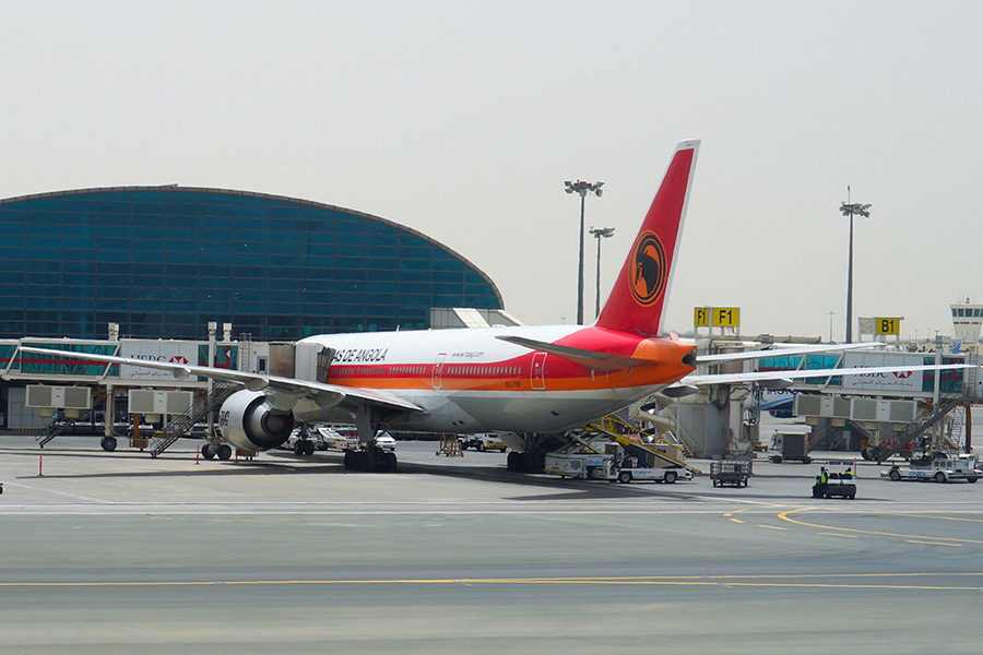 Plane makes emergency landing for worker trapped in cargo