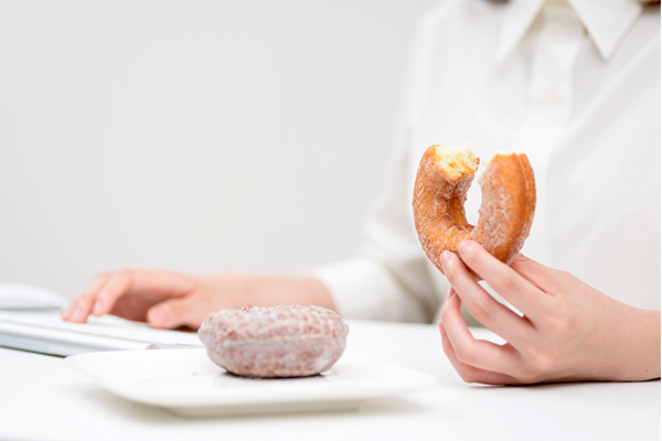 Britons deal with stress with doughnuts, crisps and biscuits 