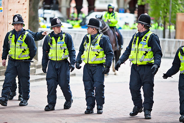 Theresa May: More female and black police needed