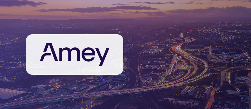 Amey logo over cityscape twilight