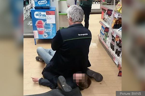Co-op employee praised for sitting on thief