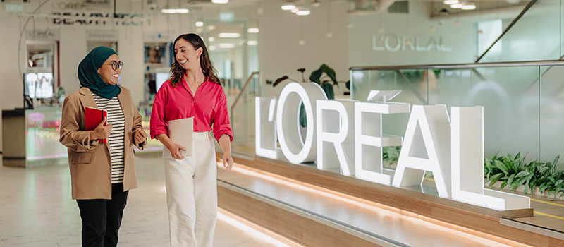 L'Oréal employees walking in office