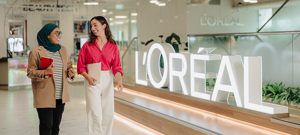 L'Oréal employees walking in office
