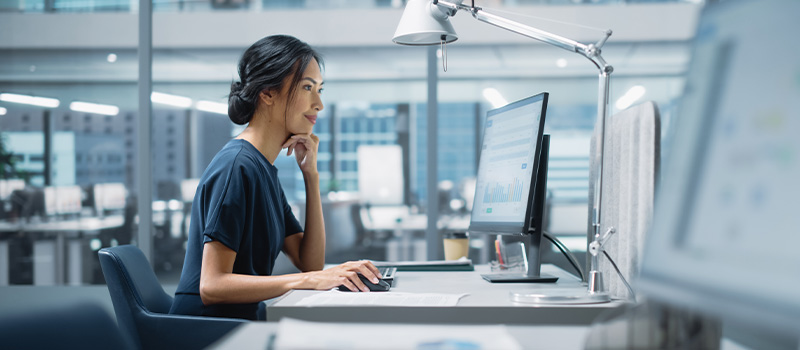 Woman working at office computer