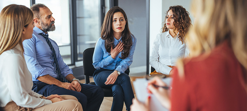 Support group therapy session discussion