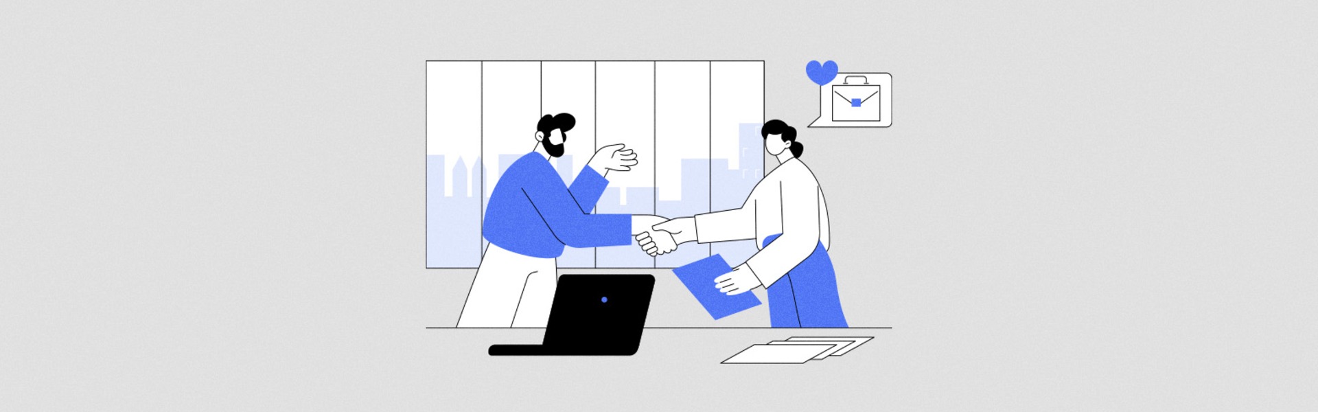 Business handshake in office setting