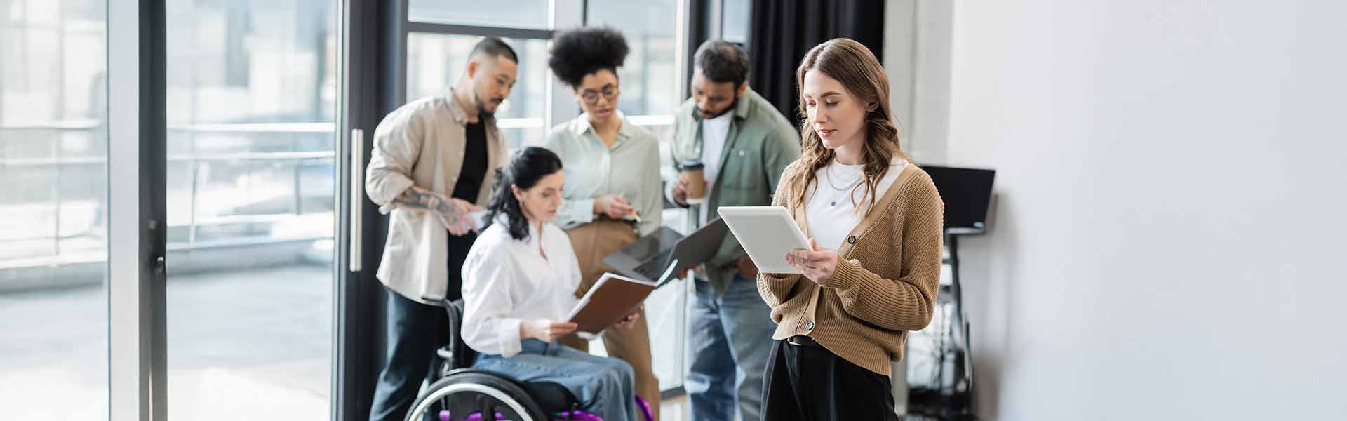 Diverse team collaborating in office
