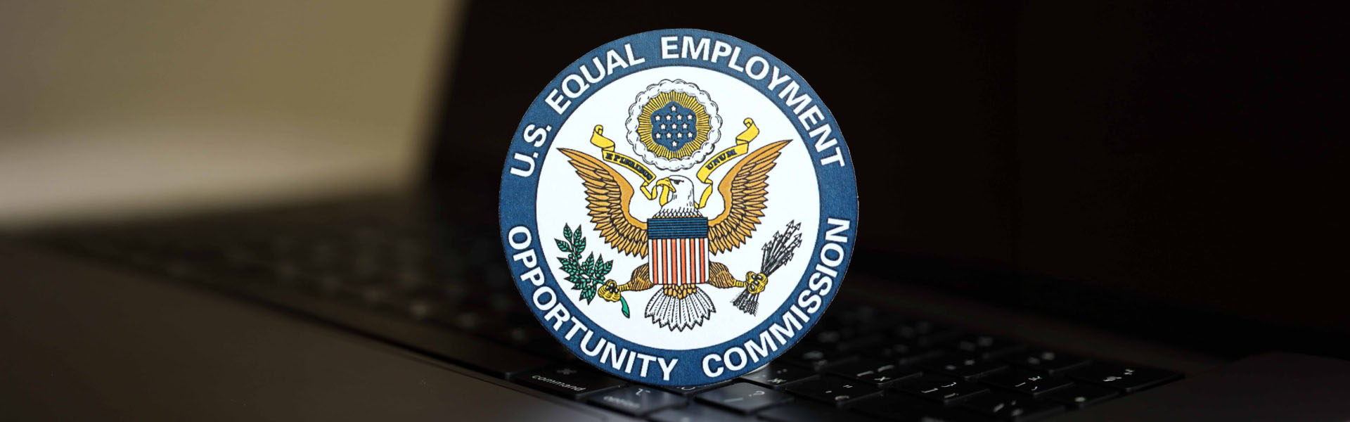 EEOC seal on laptop keyboard