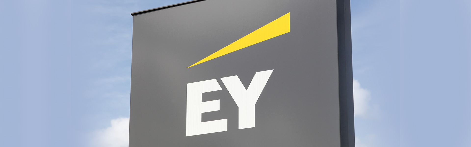 EY logo on outdoor sign
