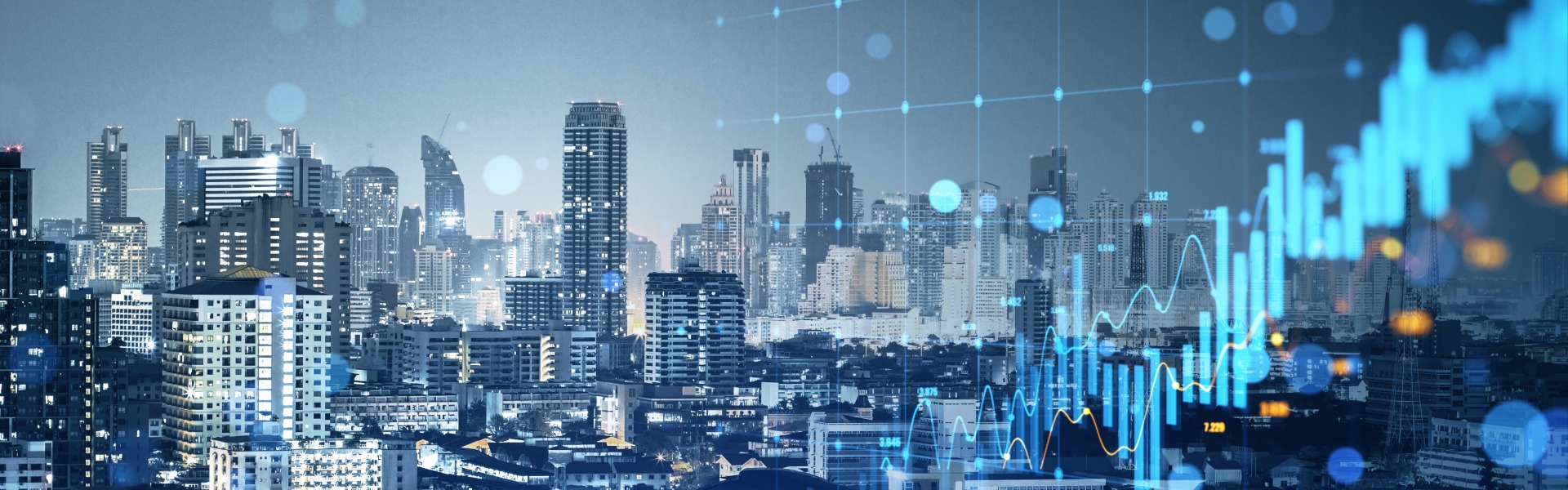 City skyline with financial graph