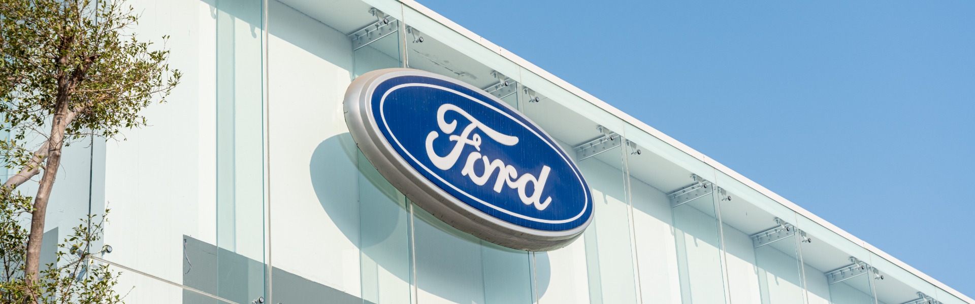 Ford logo on dealership building