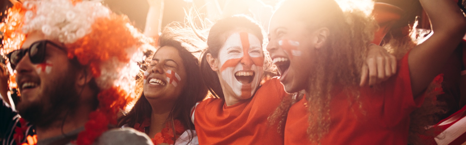 Happy football fans celebrating match
