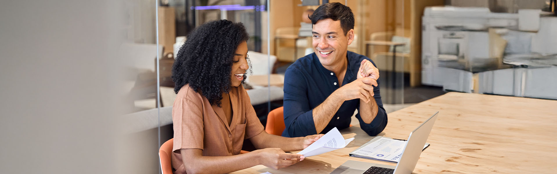 Coworkers collaborating in modern office