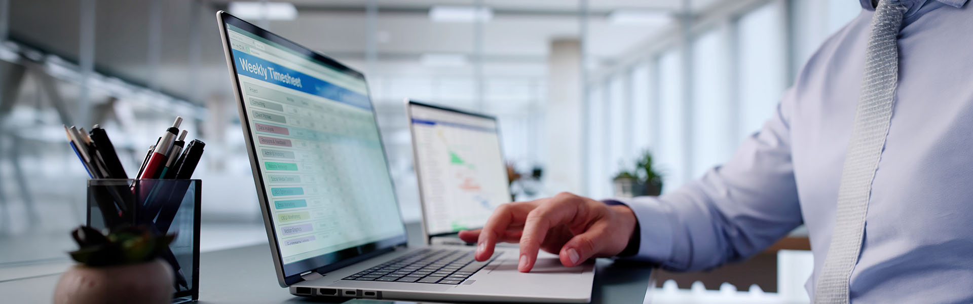 Employee updating digital timesheet