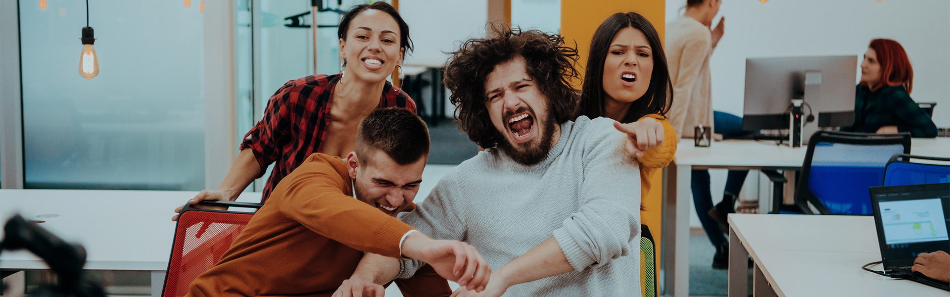 Happy coworkers having fun together