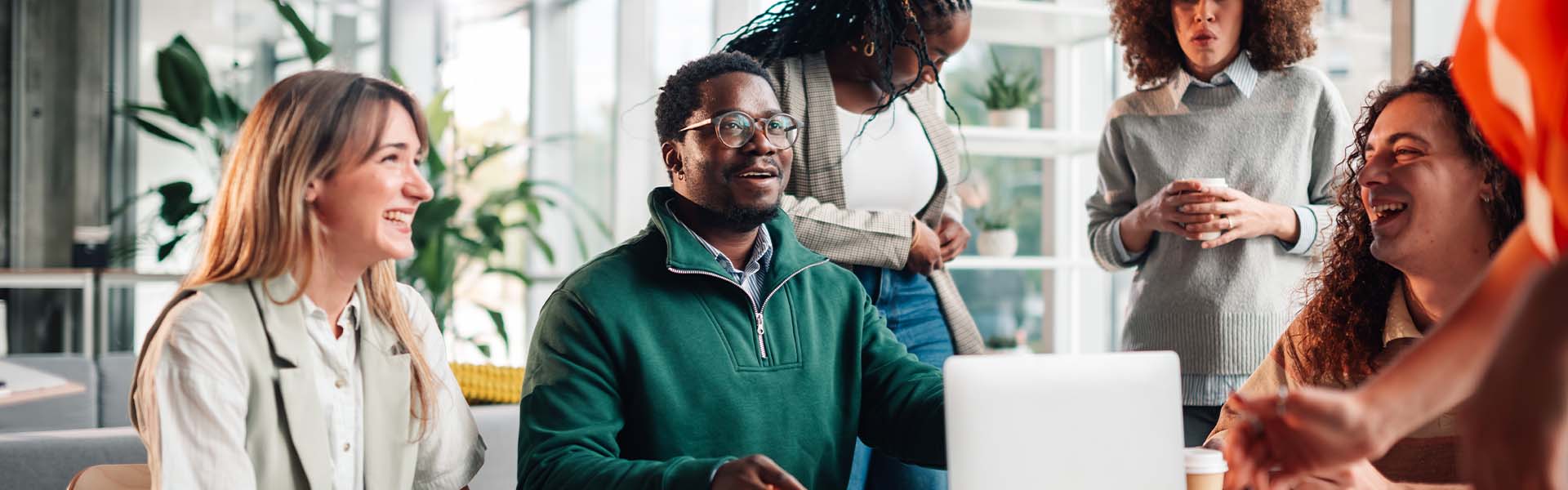 Diverse team collaborating in office