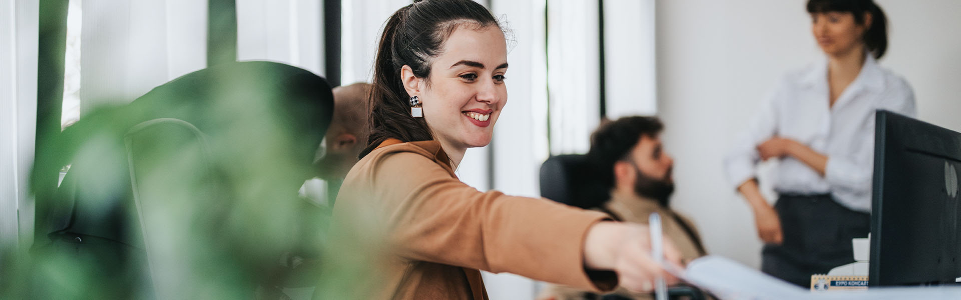 Smiling woman working in office