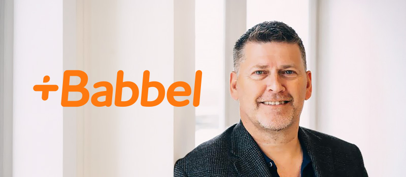 Babbel logo with Neil Berry, SVP at language learning specialist Babbel