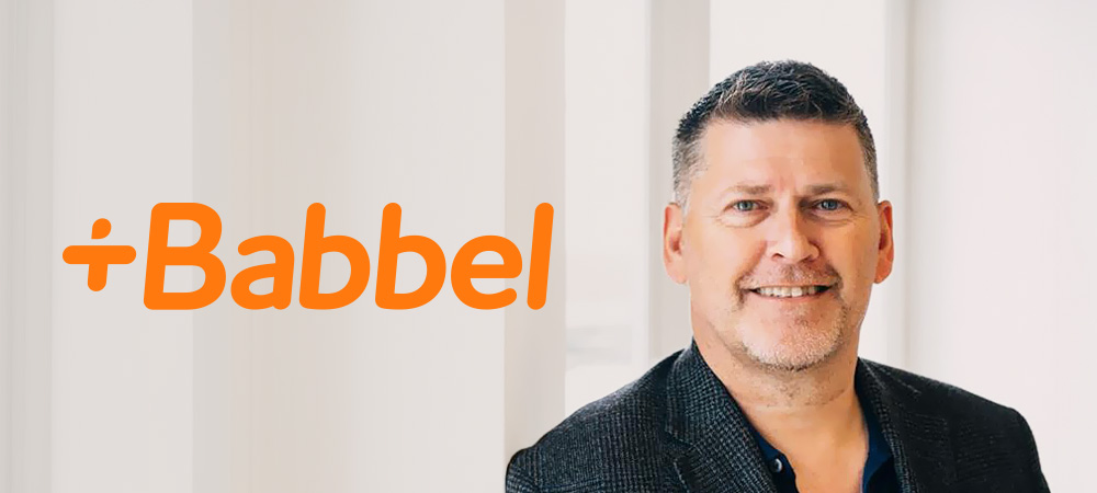 Babbel logo with Neil Berry, SVP at language learning specialist Babbel