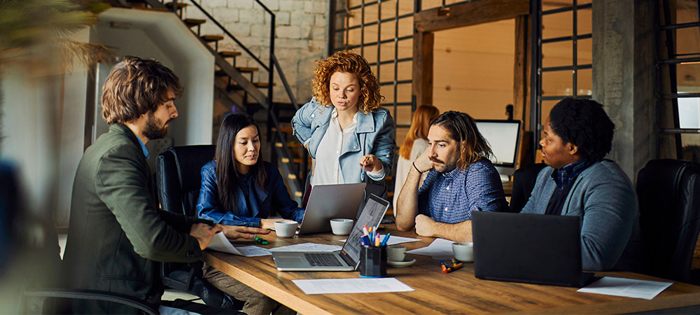 Diverse team collaborating in office