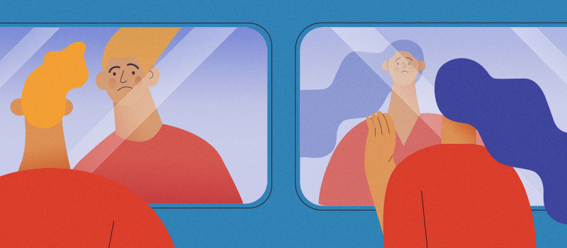 Person looking at reflection, thoughtful