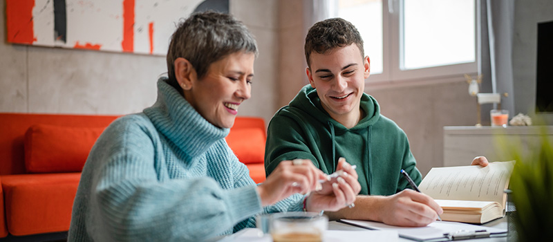 Mother and son studying together