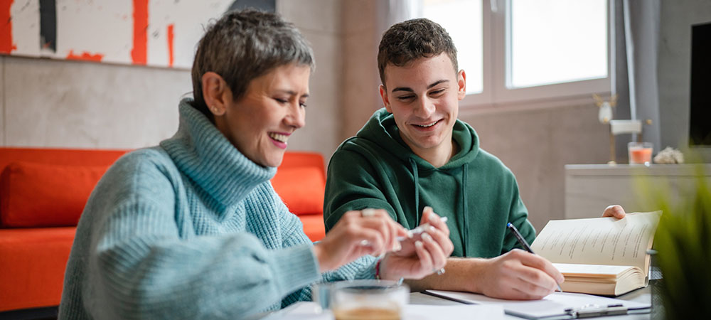 Mother and son studying together
