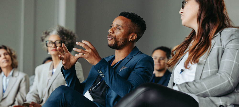 Diverse professionals at business conference