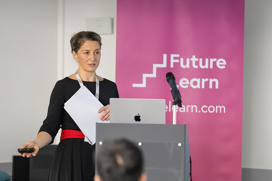 Woman presenting at conference
