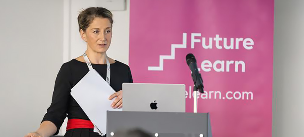 Woman presenting at conference