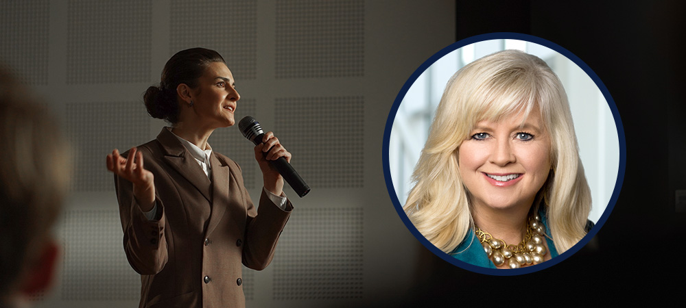 Businesswoman speaking at conference
