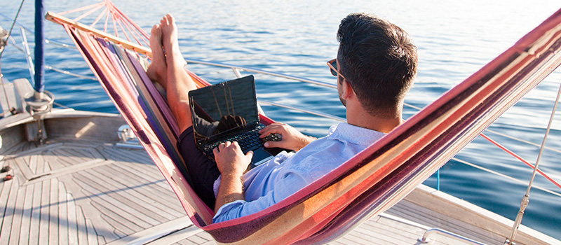 1 in 5 employees are taking their laptop on holiday amid workload pressure