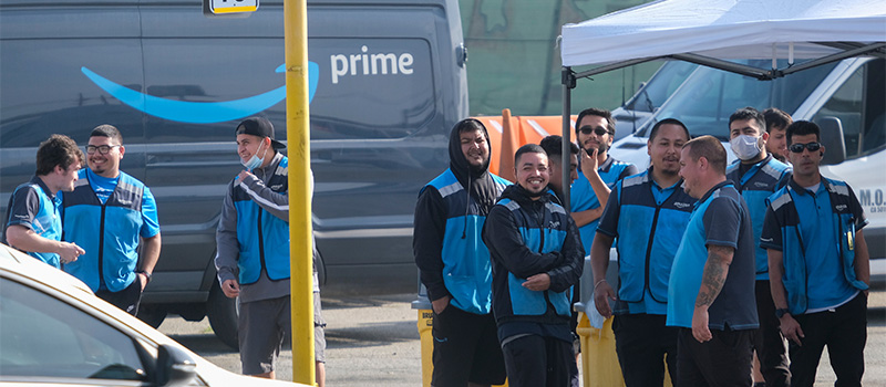 Amazon delivery team outside vans