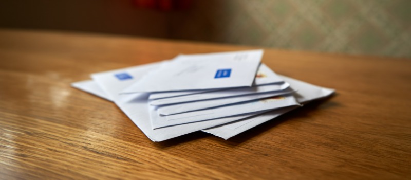 Stack of letters on table