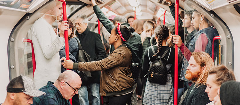 Crowded underground train with passengers