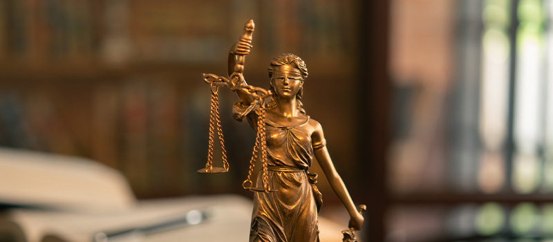 Lady Justice statue with scales