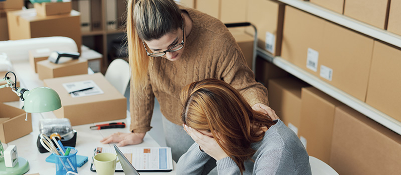 Stressed small business owners working