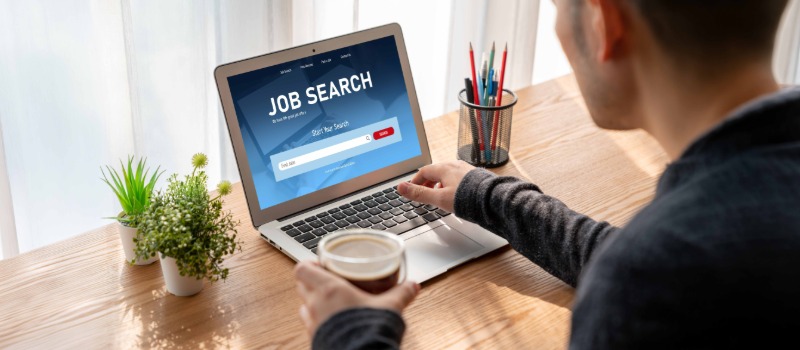 Job search on laptop screen