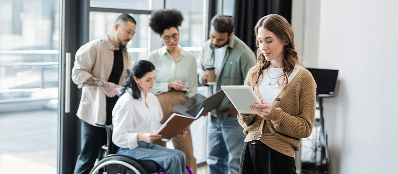 Diverse team collaborating in office