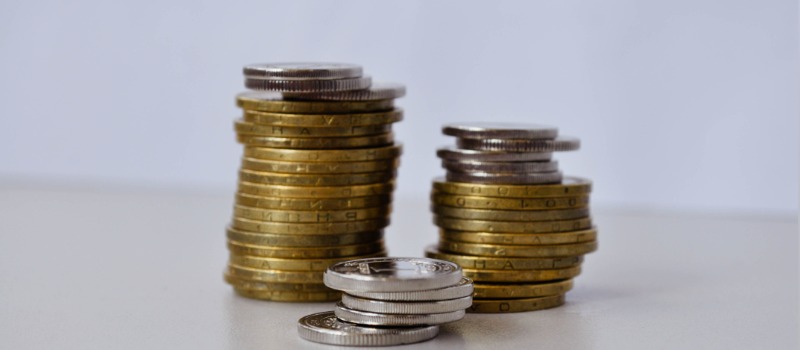 Stacks of coins on table