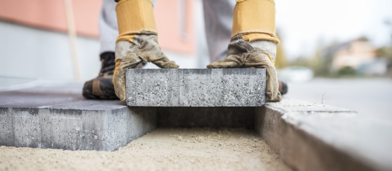 Two people analytics leaders on getting real value from AI Brick being laid on a construction site