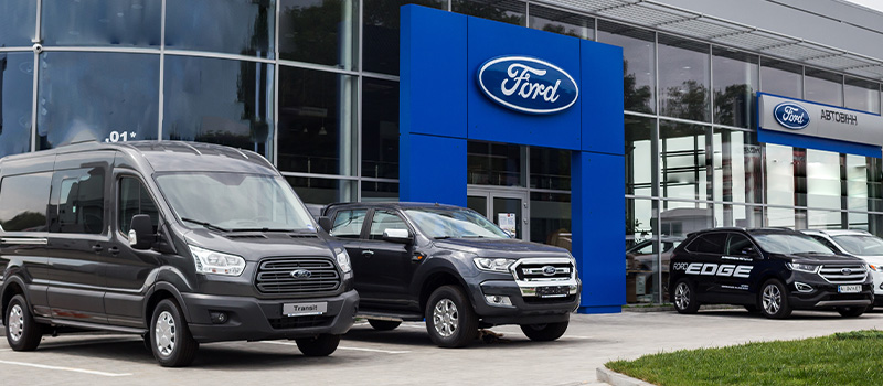 Ford dealership with parked vehicles
