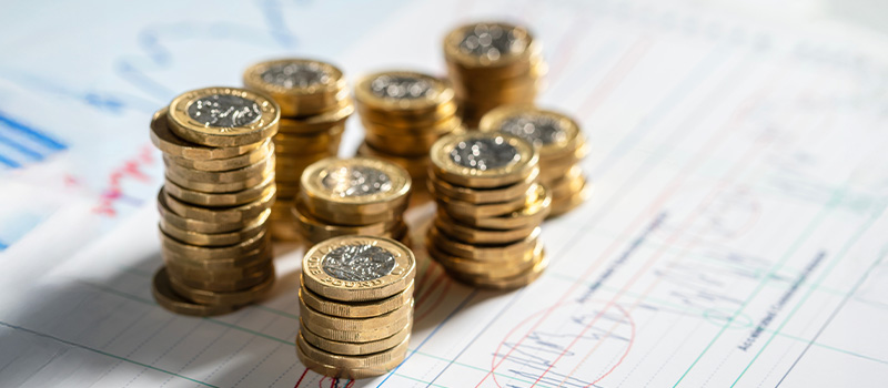 Stacks of pound coins finance