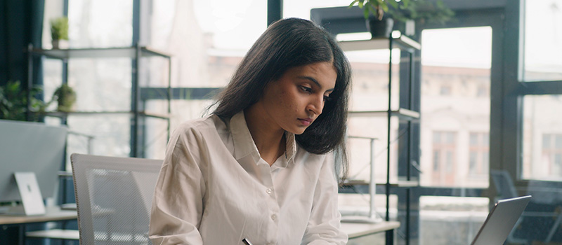 Focused woman working in office
