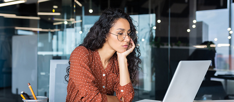 Woman working on laptop office