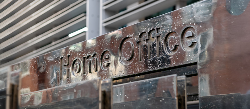Immigration compliance 'outsourced to HR' amid visa system flaws, lawyer warns Home Office building sign exterior