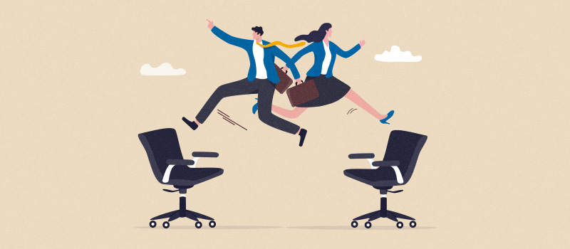 Business professionals jumping office chairs